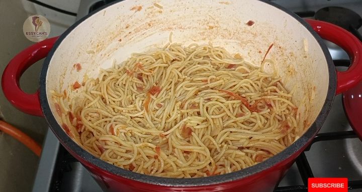 Step 4.1: Add the drained spaghetti to the skillet with the tomato sauce