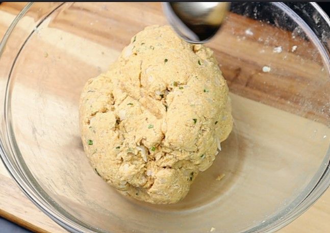 Step 2.2: Add oil and knead again until the dough is smooth