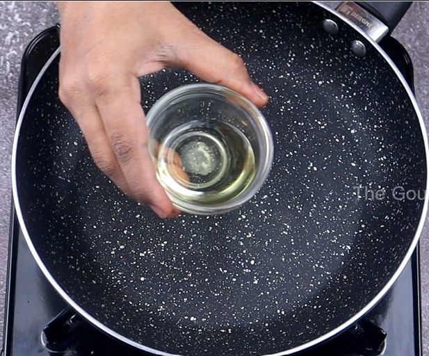 Step 2.1: In the same pan, add oil