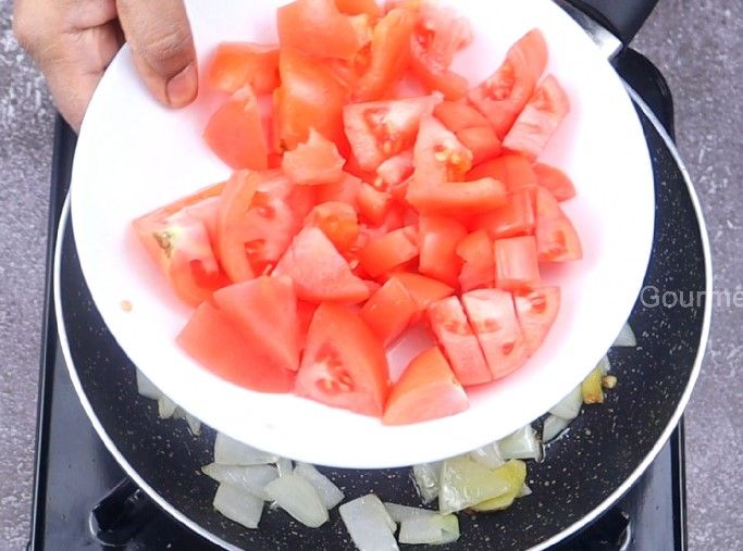 Step 2.1: Add chopped tomatoes, cashews, and salt