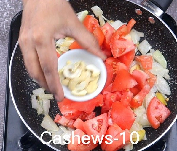 Step 2.2: Add chopped tomatoes, cashews, and salt