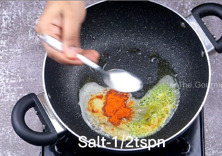 Step 4.5: In the same pan, add butter, bay leaf, turmeric powder, Kashmiri chilli powder, salt, and the prepared kadai masala powder