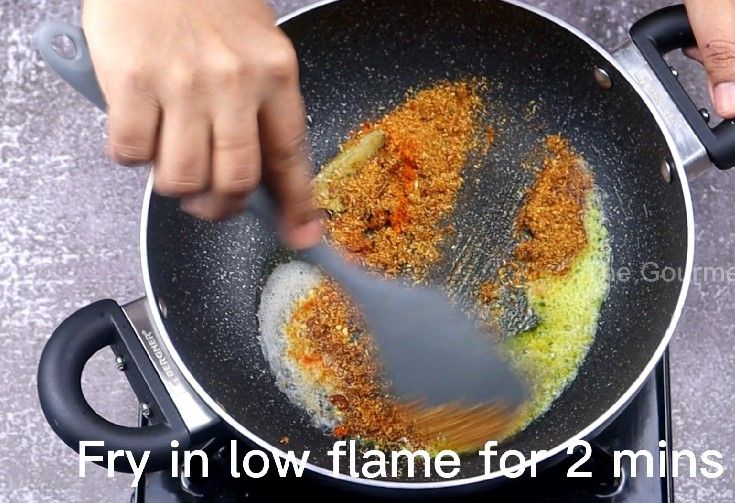 Step 4.7: In the same pan, add butter, bay leaf, turmeric powder, Kashmiri chilli powder, salt, and the prepared kadai masala powder