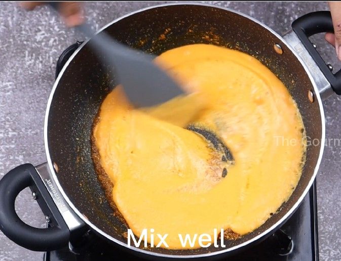 Step 4.2: Add the prepared tomato paste and saute until oil separates, about 15 minutes on low flame