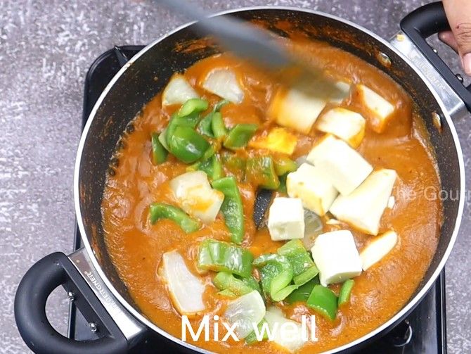 Step 4.3: Add the sauteed onion and capsicum petals, then add cubed paneer