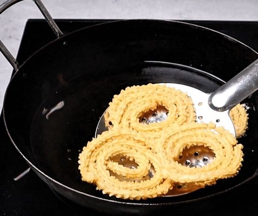 Step 2.2: Fry by flipping occasionally until they turn golden brown