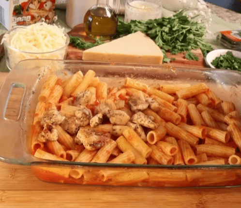 Step 1.1: In a baking dish, combine the cooked pasta, tomato sauce, ricotta cheese, half of the mozzarella, and the cooked chicken
