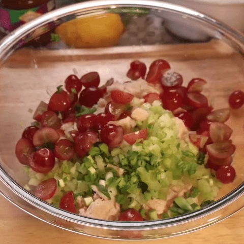 Step 1.1: In a large bowl, mix shredded chicken, halved grapes, chopped celery, and sliced onions