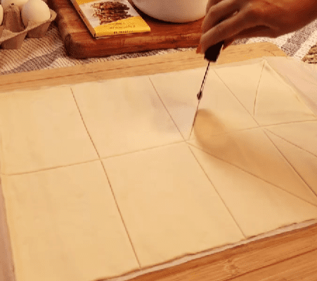 Step 1.1: Unroll the puff pastry and slice it into 8 equal rectangles
