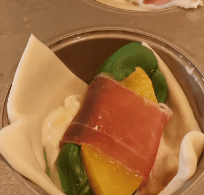 Step 1.1: Place each wrapped bite on top of the burrata