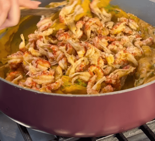 Step 1.1: Stir in crawfish tails and simmer for another 10 minutes