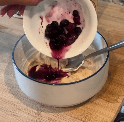 Step 2.1: Prepare the frosting by mixing peanut butter, plain Greek yogurt, and berry juice or mashed berries