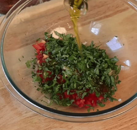 Step 1.1: Add basil, olive oil, salt, and pepper to the bowl