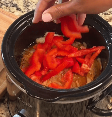 Step 1.1: Add pork, onion, garlic, and bell pepper to the crockpot
