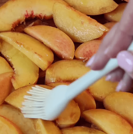 Step 1.1: Coat the peaches in a light layer of olive oil, salt, and pepper