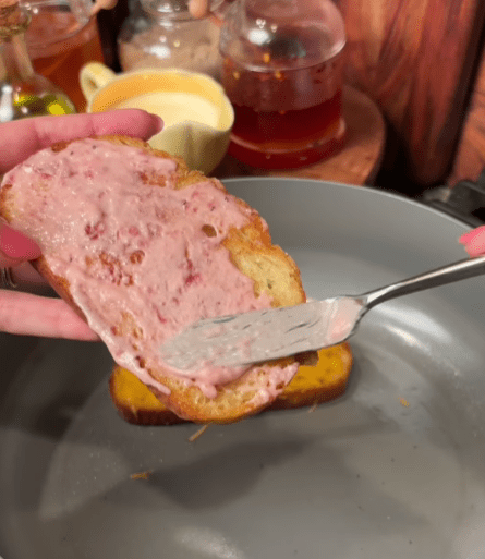 Step 1.1: Mix equal parts cranberry sauce and mayonnaise, then spread the mixture on one slice of the toasted bread