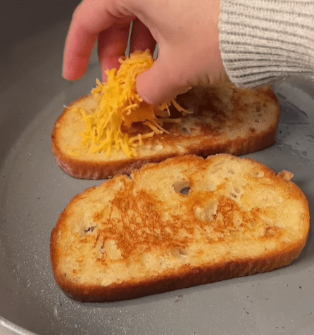 Step 1.1: Melt sharp cheddar cheese on the other slice of bread