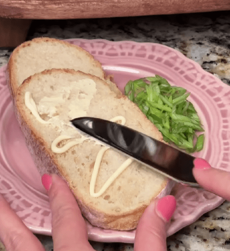 Step 1.1: Spread mayo on both sides of sourdough bread and toast in a pan over medium heat until golden