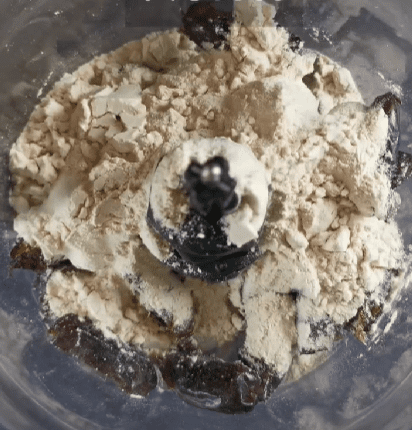 Step 1.1: Process the dates, protein powder, and maple syrup in a food processor until you get a sticky ball