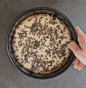 Step 3.1: Top the cream layer with cacao nibs, chocolate chips, or other desired toppings