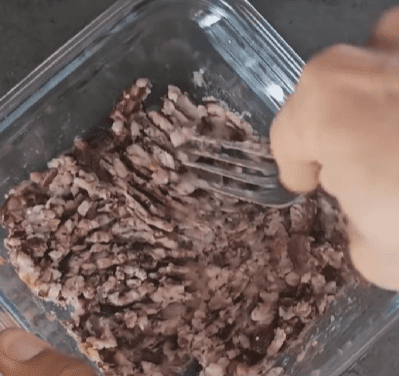 Step 1.1: Mash the cooked red beans in a mixing bowl until smooth