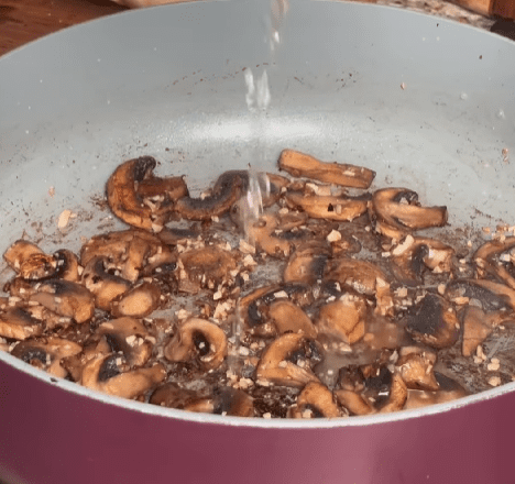 Step 1.1: Deglaze the pan with dry white wine and simmer for 3–4 minutes to enhance the flavor