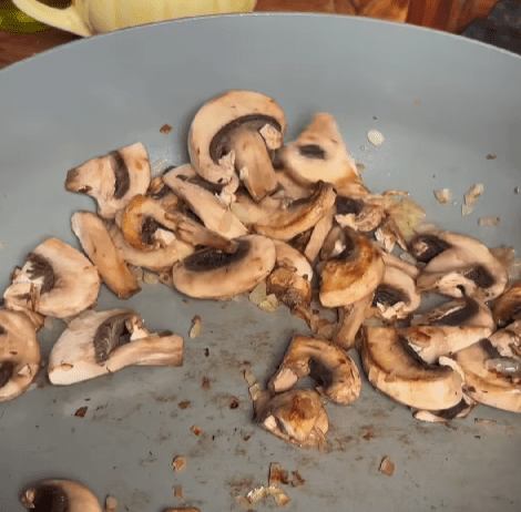 Step 1.1: Heat olive oil in a pan and sauté diced onion until translucent