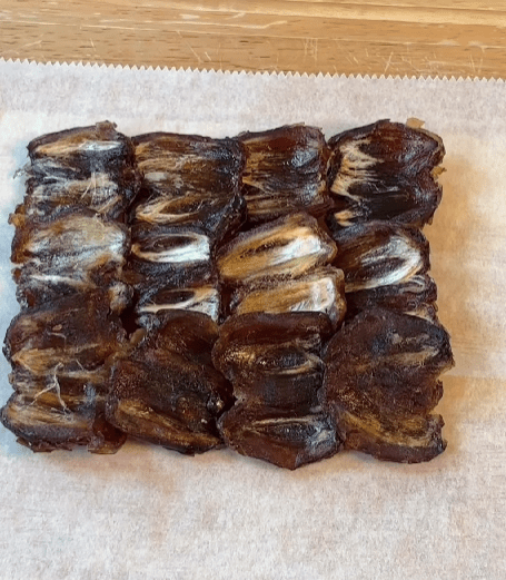 Step 1.1: Roll the dates out between parchment sheets until you have an even layer