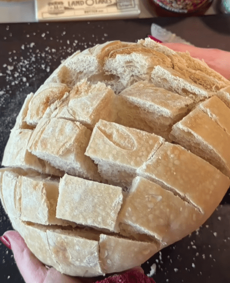 Step 1.1: Cut the sourdough in a deep crosshatch pattern, about ¾ of the way down, ensuring not to cut through the bottom