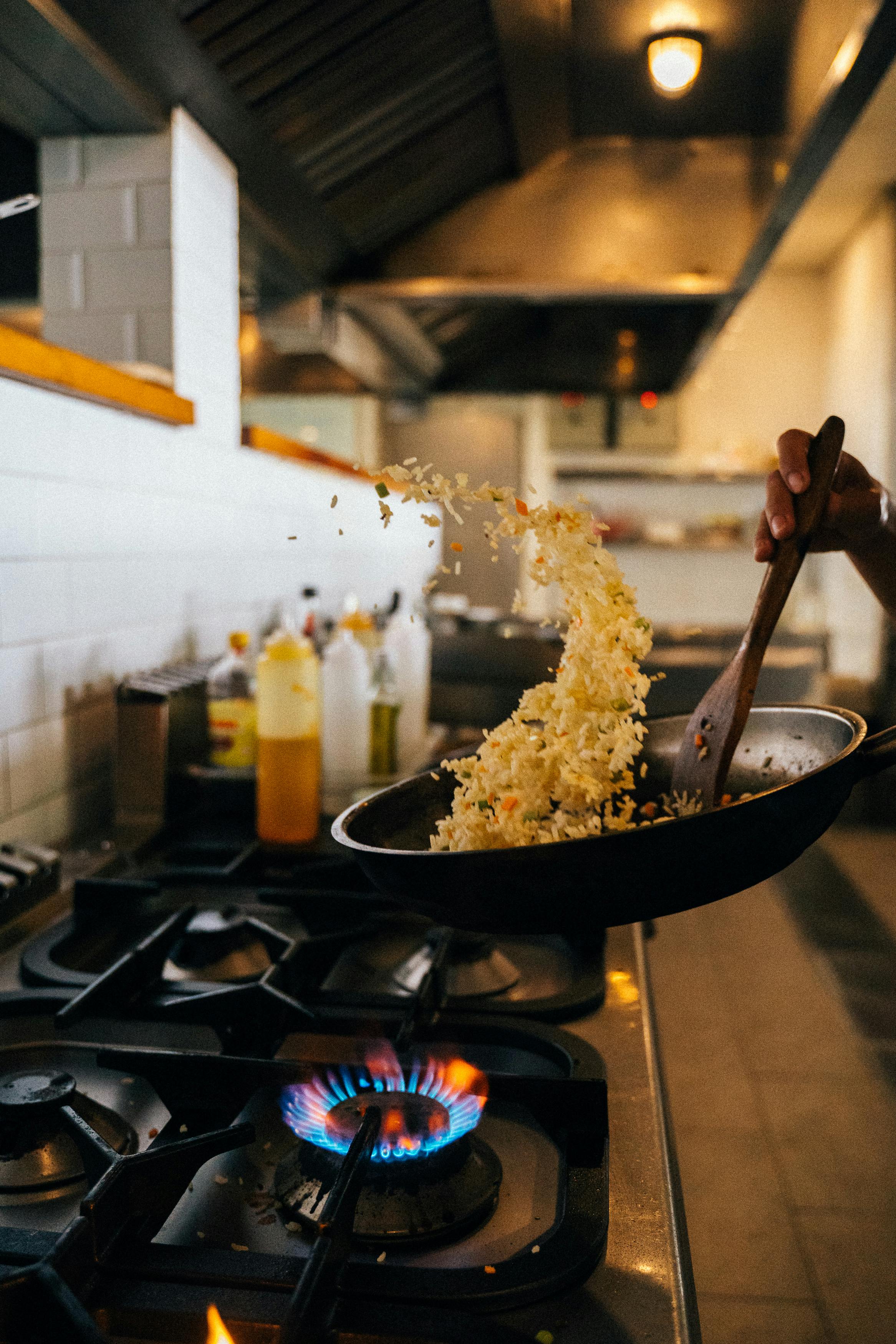 Food being cooked in a pan.