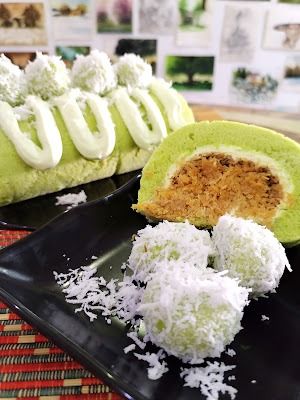 Step 3.1: Pipe reserved pandan frosting on Swiss roll and top with pandan ondeh-ondeh for decoration