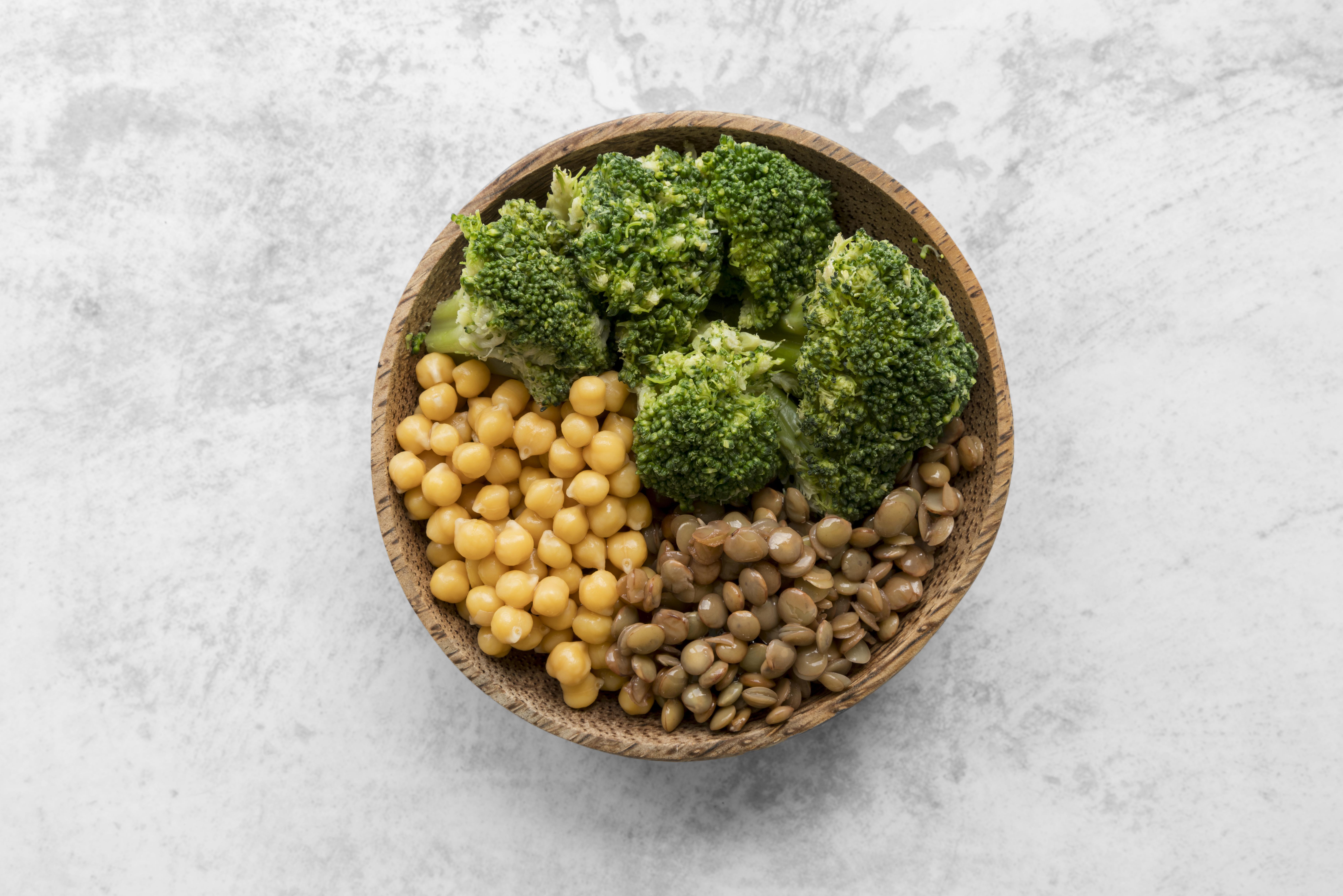Plant-based Protein sources like chickpea and broccoli placed in a bowl