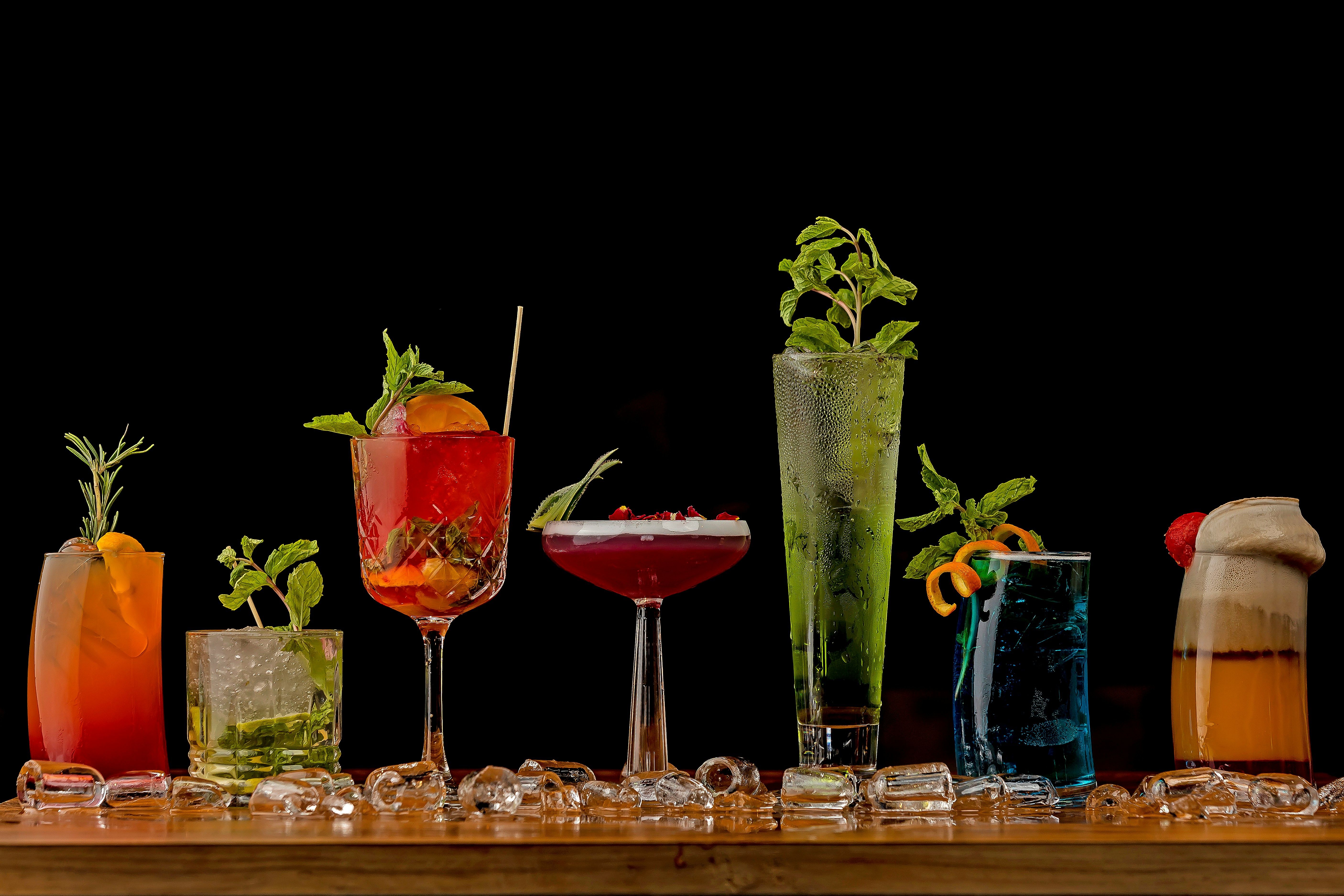 a table topped with different kinds of drinks