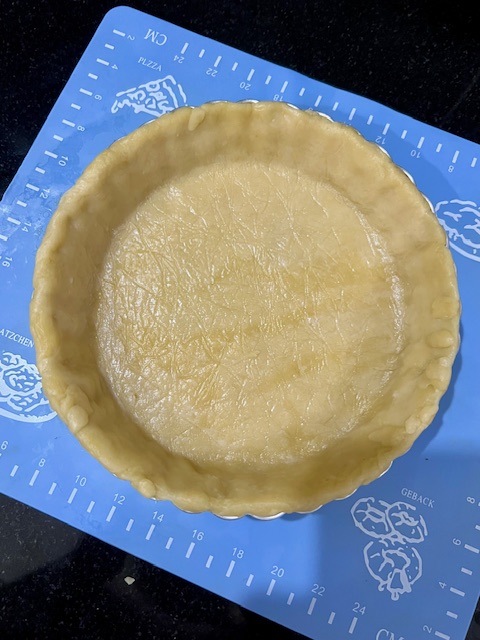 Step 1.2: Press the chilled dough into the removable base tart pan