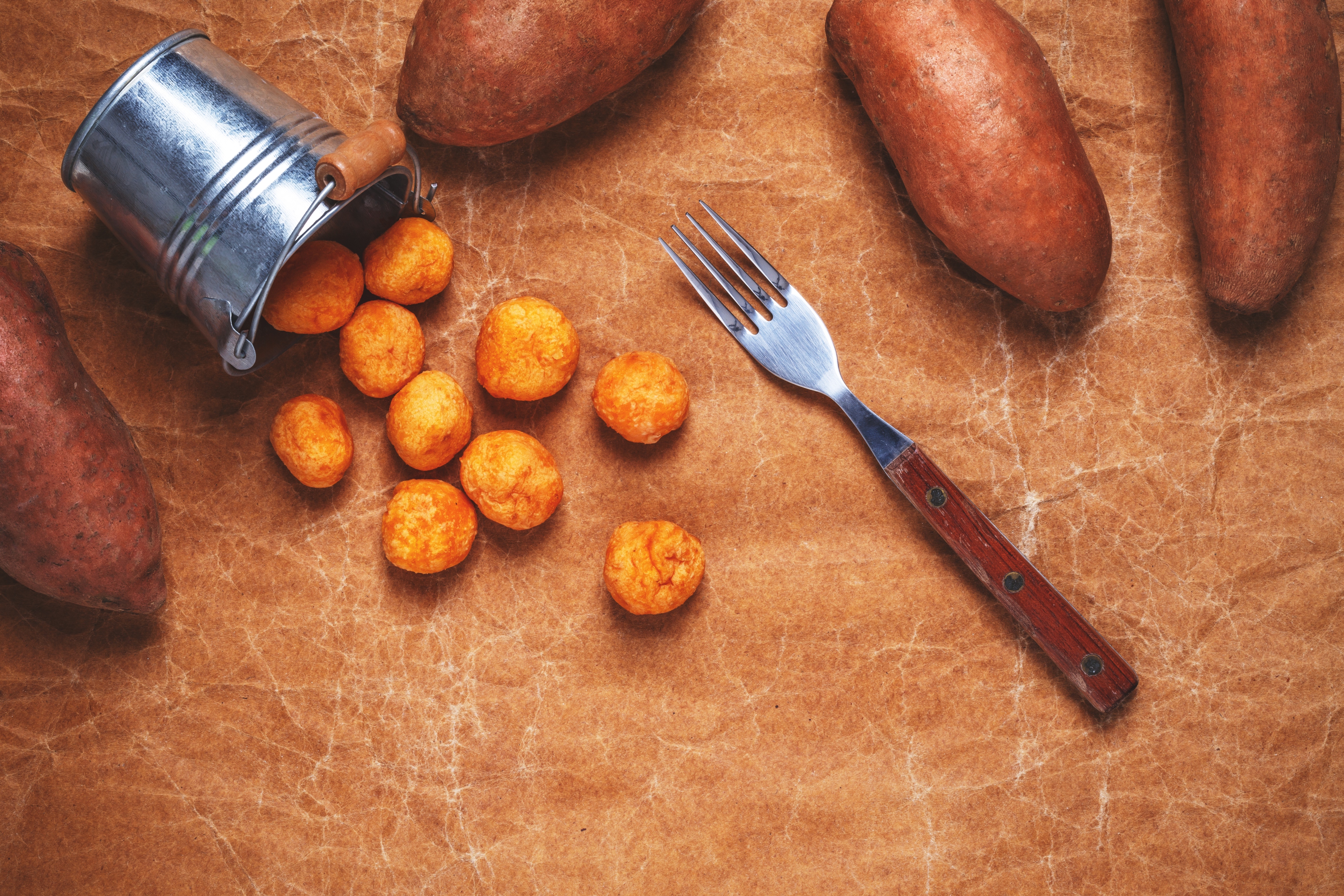 High angle view of Flat lay arrangement with sweet potatoes