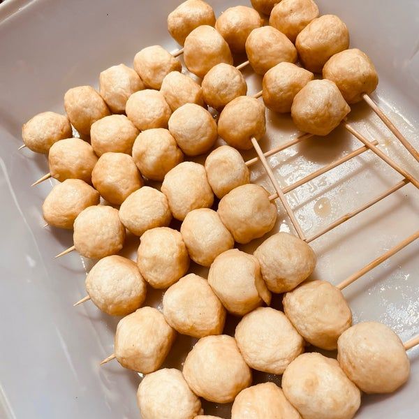 Step 1.2: Add the fish balls, chicken balls (sliced in half), or kikiam