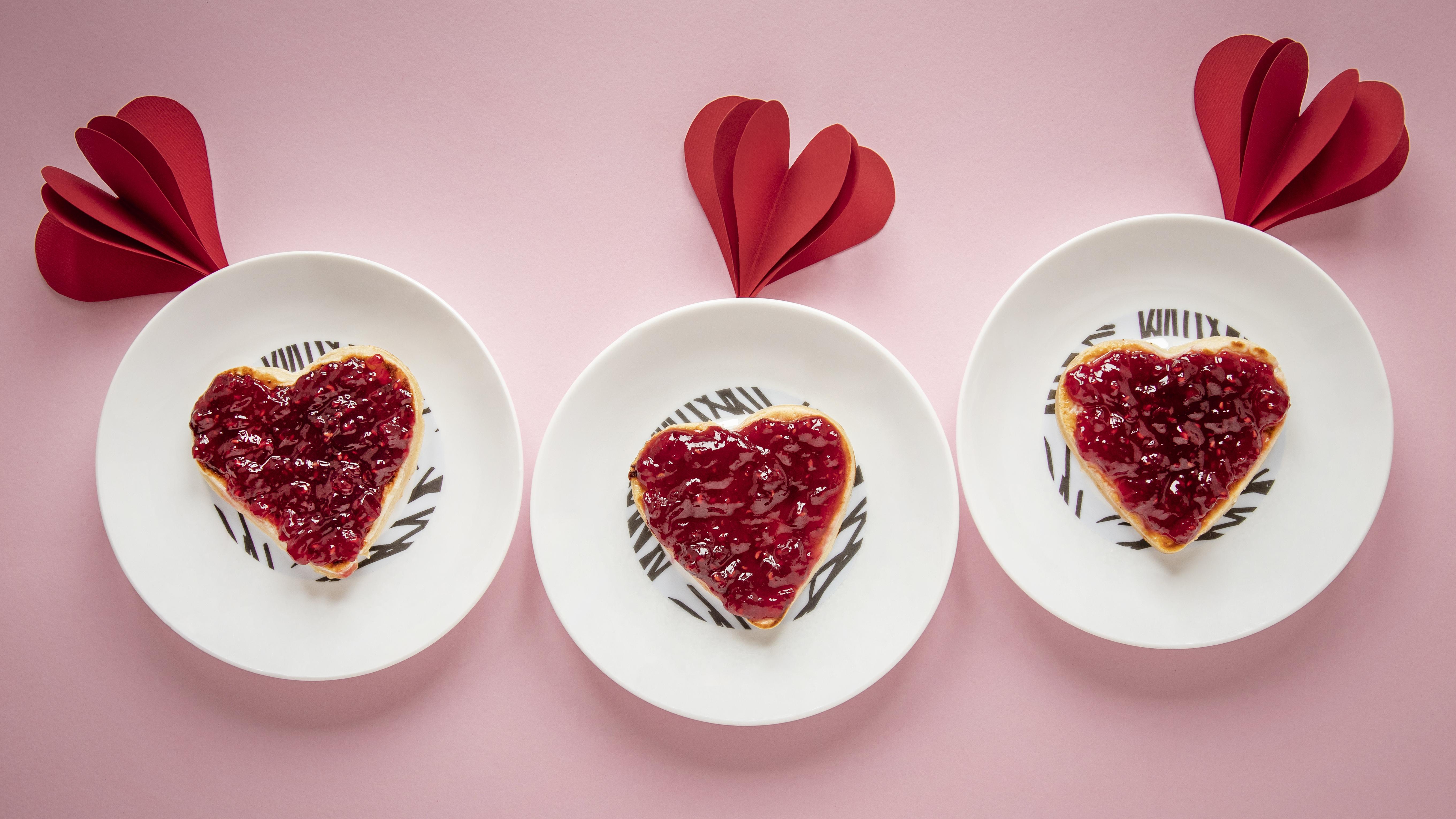 Top view of beautiful valentine's day concept - heart shaped strawberry tart 