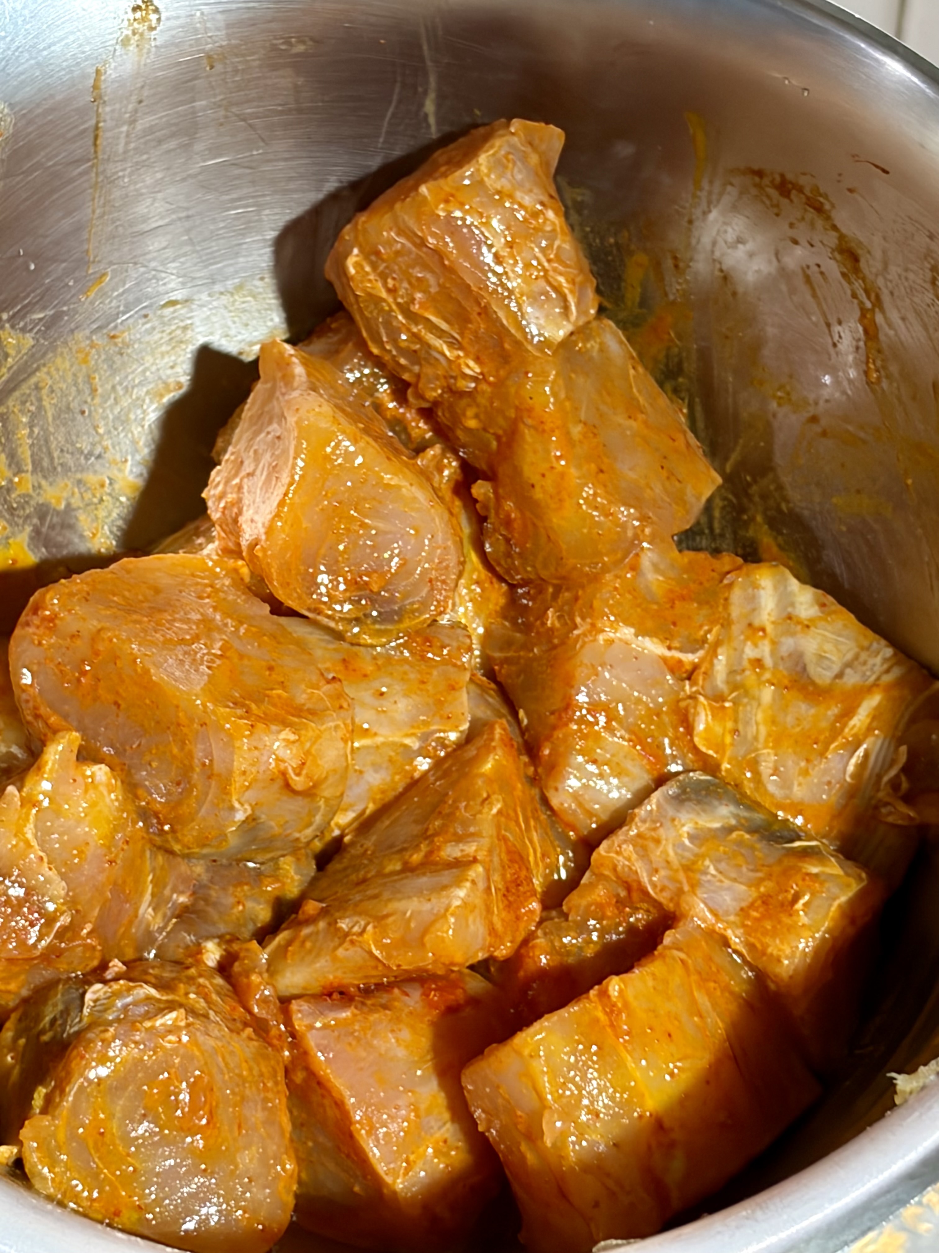 Step 1.1: Place them in a bowl and add salt, turmeric, Kashmiri chilli powder, oil, and lemon juice