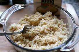 Step 3.1: After 5 minutes, fluff the couscous with a fork and drizzle with olive oil