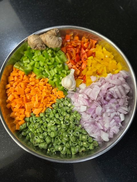 Step 2.1: Add carrots, beans, zucchini, broccoli, bell peppers, and sweet corn