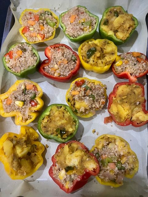 Step 5.3: Spoon the quinoa mixture into the bell pepper halves