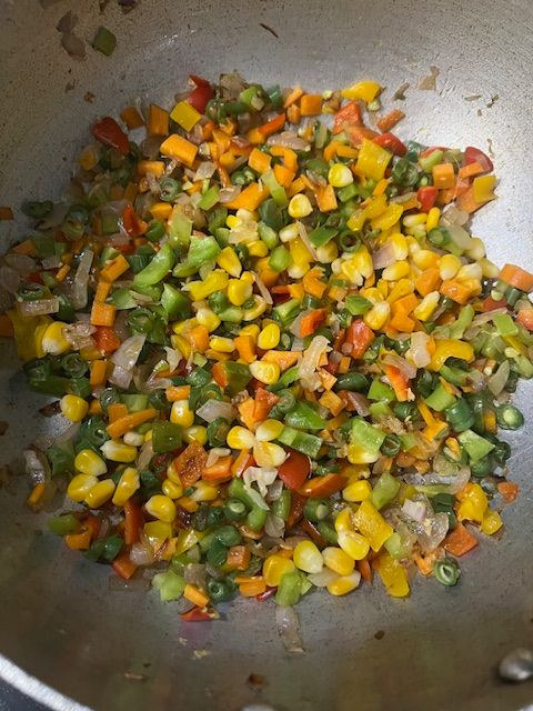 Step 2.2: Add carrots, beans, zucchini, broccoli, bell peppers, and sweet corn