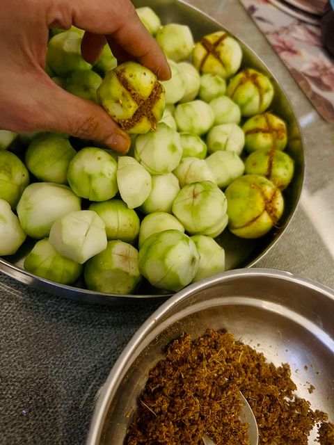 Step 2.1: Stuff each slit with the masala paste