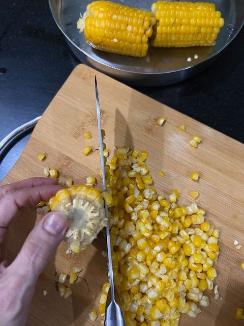 Step 1.1: Using a knife, scrape off the kernels from the cob