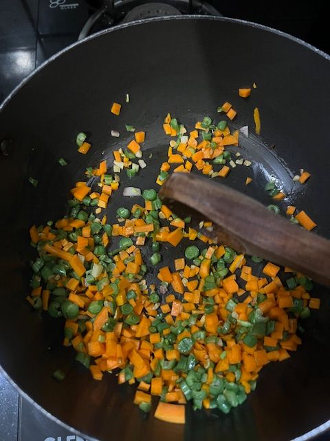 Step 3.1: Add finely chopped carrots and beans