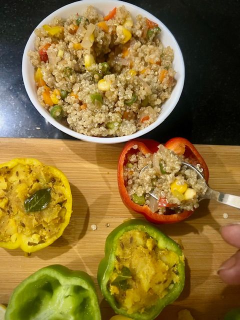Step 5.1: Spoon the quinoa mixture into the bell pepper halves