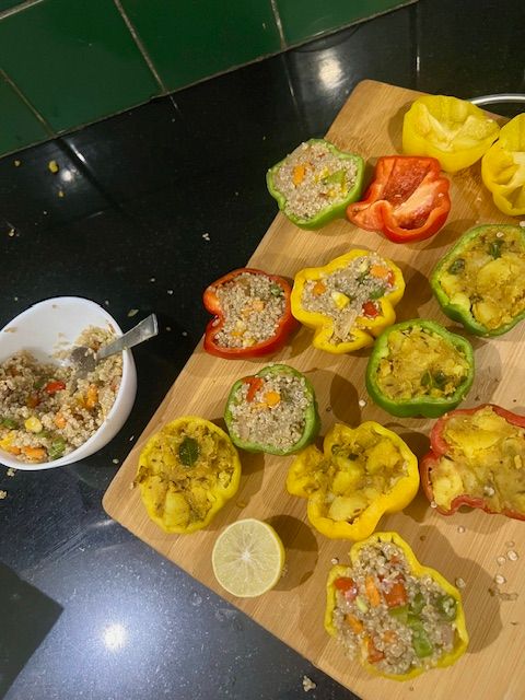 Step 5.2: Spoon the quinoa mixture into the bell pepper halves