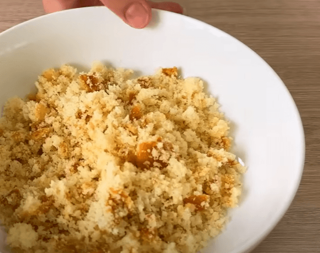 Step 1.1: Crumble the vanilla cake or muffins into the bottom of each cup