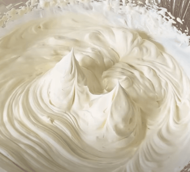 Step 1.1: In a separate bowl, whip the cream with 2 tbsp of sugar until stiff peaks form