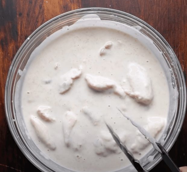 Step 2.1: Coat chicken pieces in the batter